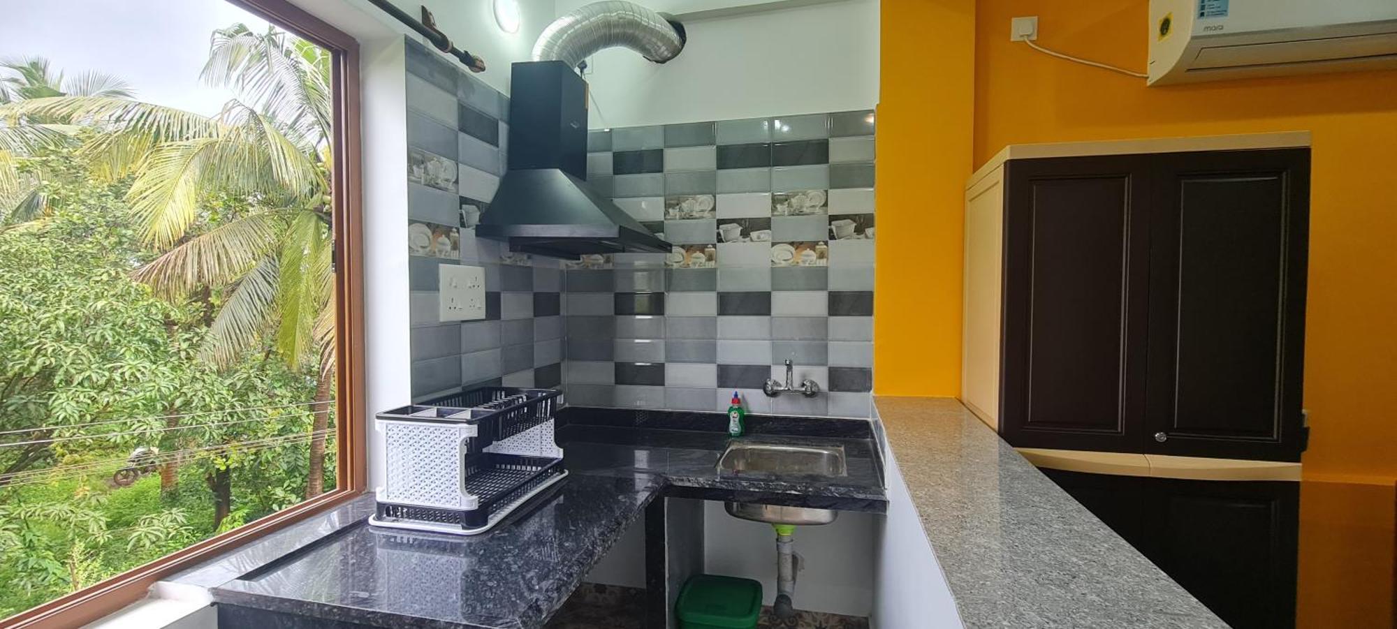 Happy Moon Homestay Aldona Esterno foto